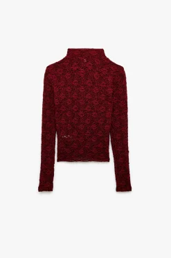 Blusa de encaje texturizada