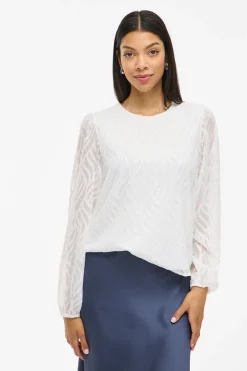Blusa manga larga con cuello redondo