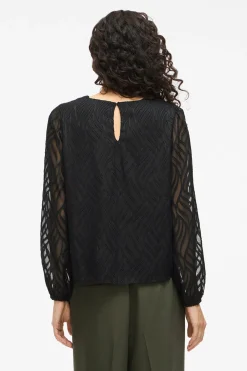 Blusa manga larga con cuello redondo