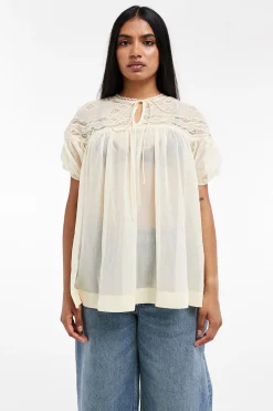 Blusa semitransparente