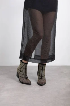 Botín cowboy tachas