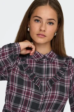 Camisa de volantes