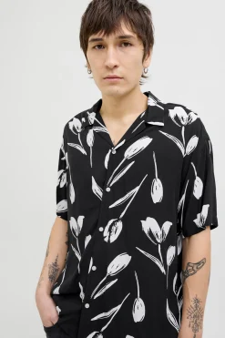Camisa relaxed fit manga corta