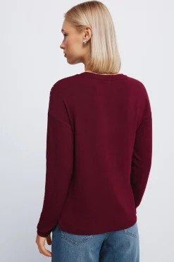 Camiseta punto cortado tachas