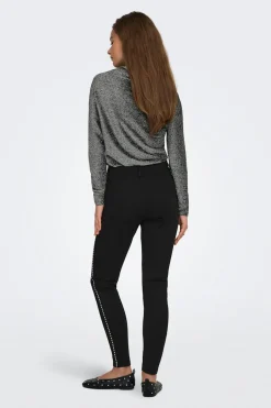 Legging tachuelas laterales