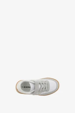 Zapatillas deportivas de ni&ntilde;os con piezas en contraste y cord&oacute;n el&aacute;stico